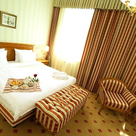 Grand Tien Shan Hotel Almaty Quarto foto