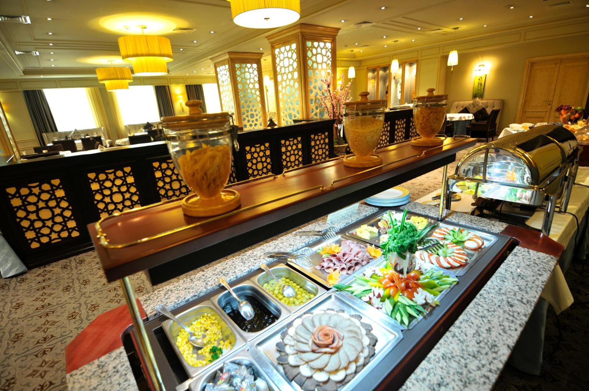 Grand Tien Shan Hotel Almaty Restaurante foto