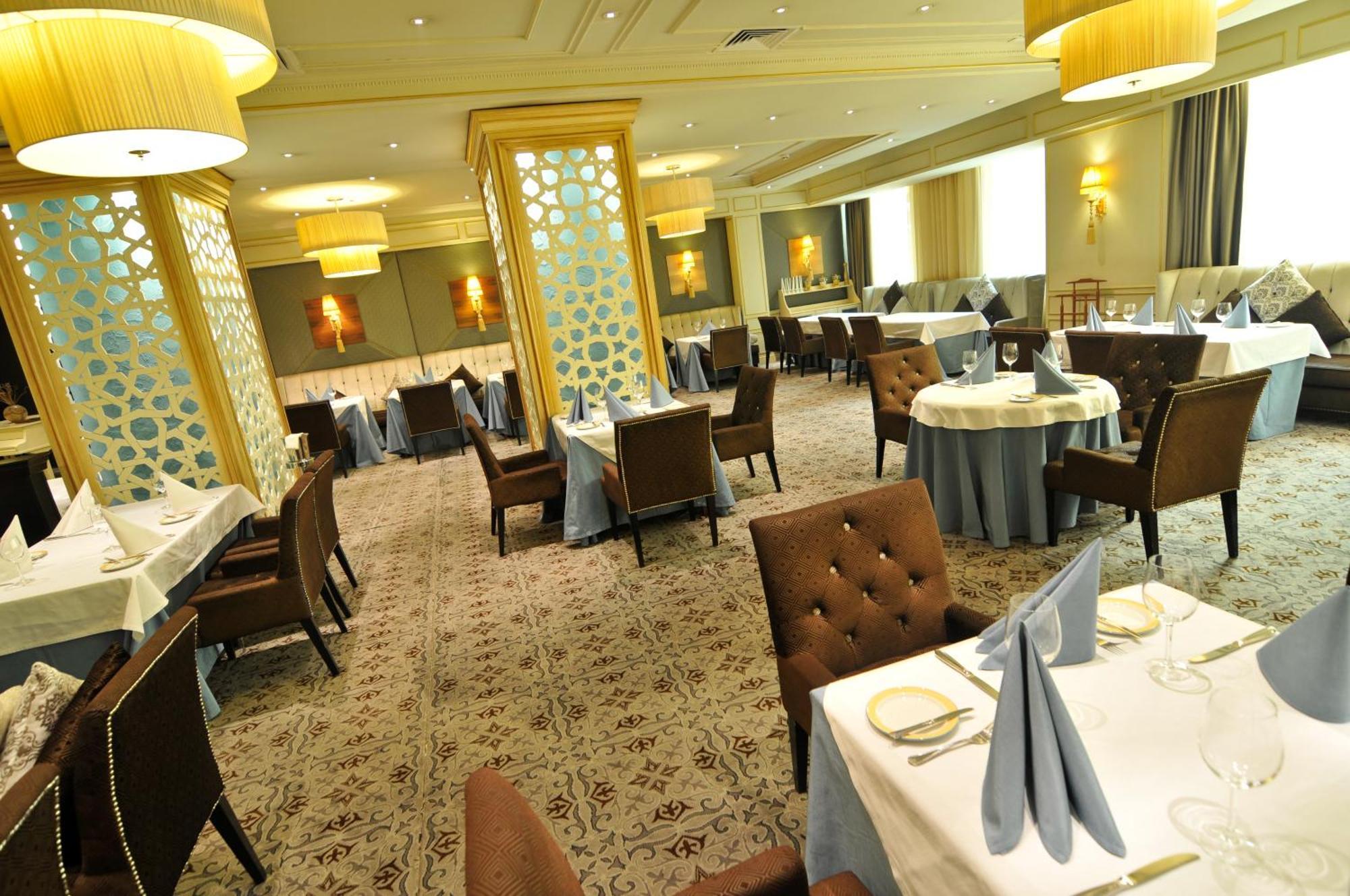 Grand Tien Shan Hotel Almaty Restaurante foto